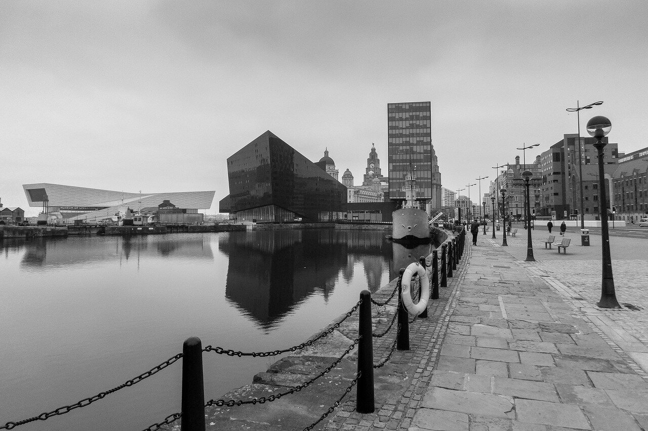 Daniel Farke, the Leeds manager, strategizing with his coaching staff during a match, emphasizing tactical innovations