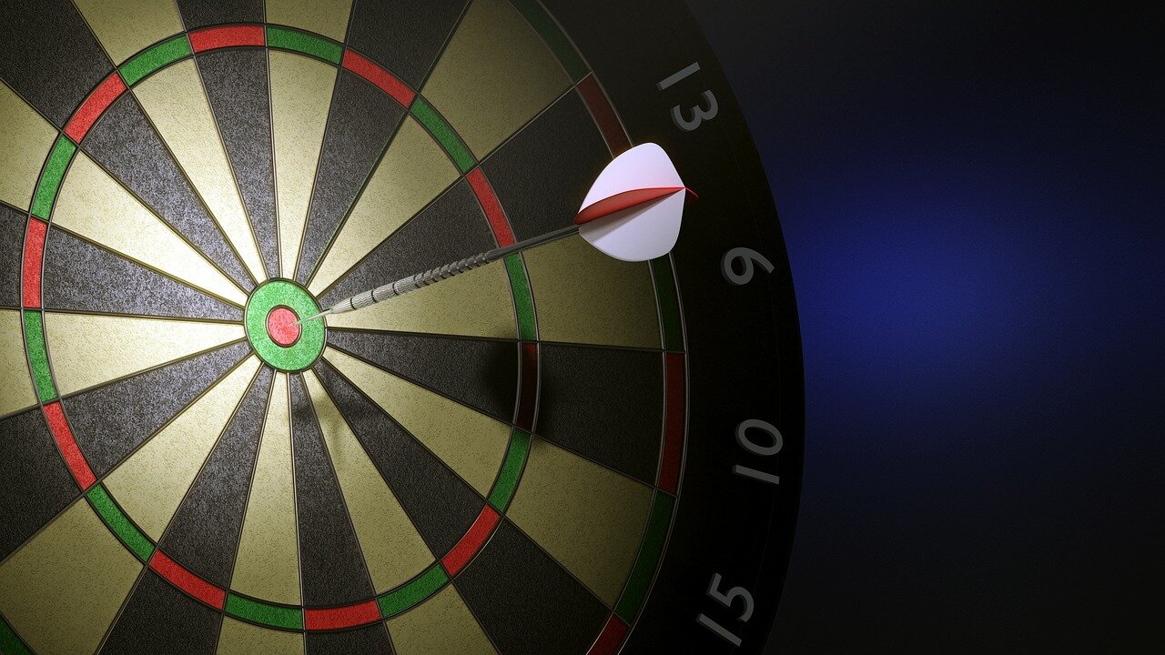 The intense atmosphere of the US Darts Masters showcases enthusiastic fans cheering for their favorite players during the tournament