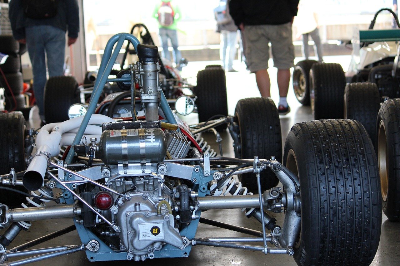 A team engineer reviews telemetry data, focusing on optimizing car performance in preparation for the unique demands of each circuit