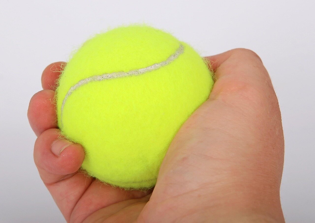 Novak Djokovic and Jannik Sinner are seen on the grass courts of Wimbledon, both displaying intense focus and determination during their challenging firstround matches.