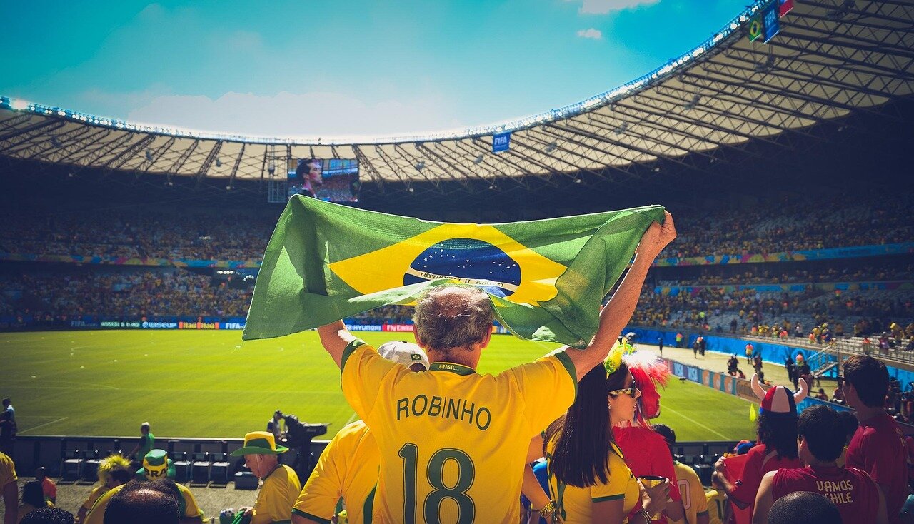 An innovative football shirt design featuring bold colors and patterns, representing a blend of tradition and modernity, poised for the upcoming tournament
