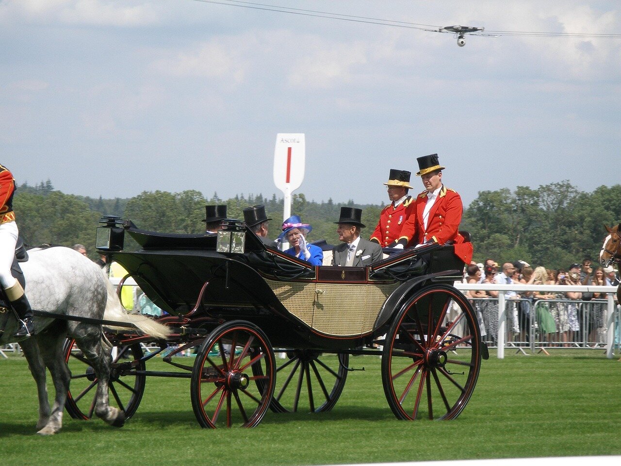 Spectators cheer enthusiastically as Thesecretadversary competes fiercely in the prestigious Prix Jean Prat, reflecting the excitement of the event