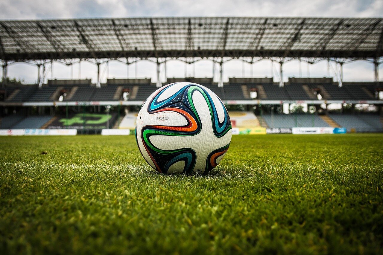 A legal team in a courtroom discussing the implications of the recent ruling, emphasizing the intersection of sports and law