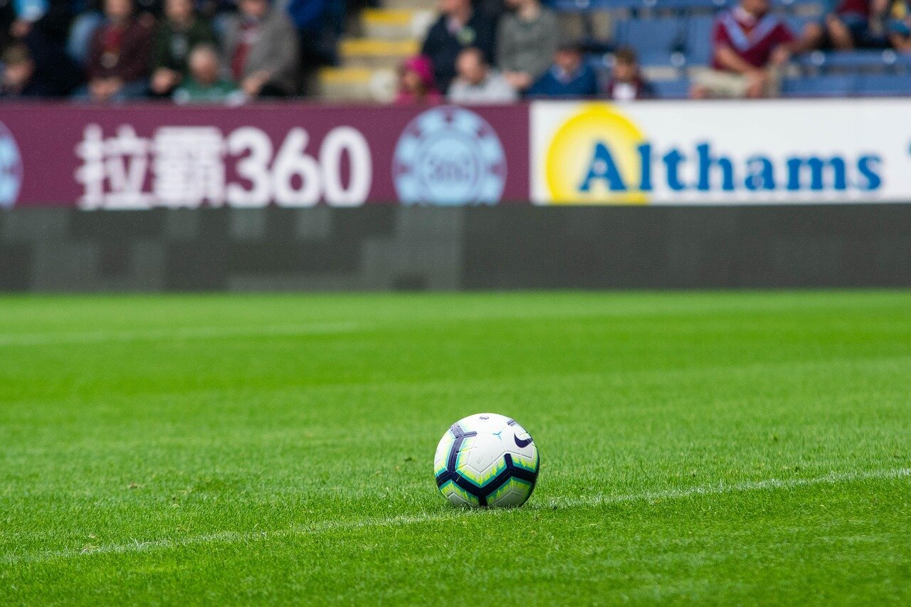Liverpool's defense in action, showcasing teamwork and strategic positioning against their rivals