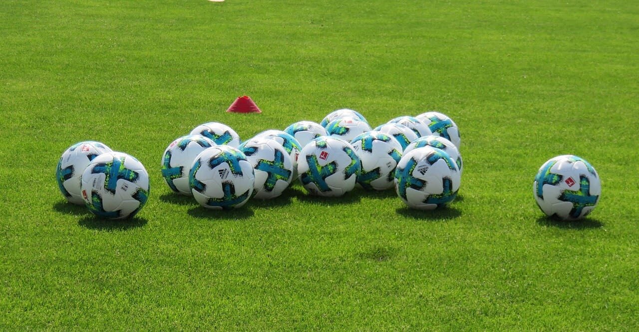 A vibrant crowd at the World Cup, filled with enthusiastic fans cheering for their favorite teams and players